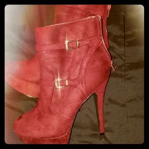 Maroon high heeled boots